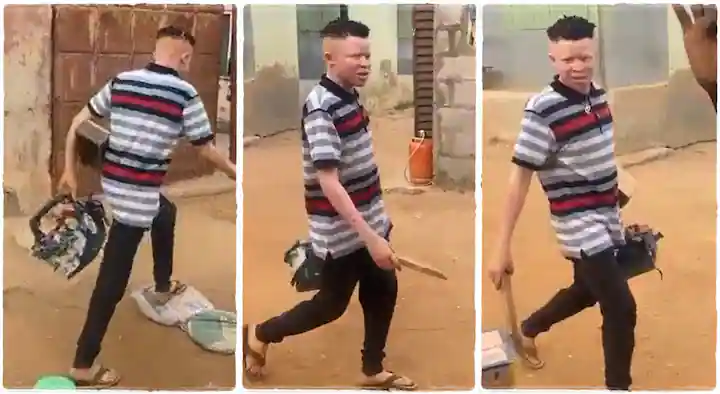 "I Have Not Seen it Before": Nigerian Albino Who is Shoe Mender Walks Around With His Basket, Video Goes Viral
