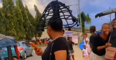 Nigerian lady stirs reactions on online with her unique umbrella-like hairstyle